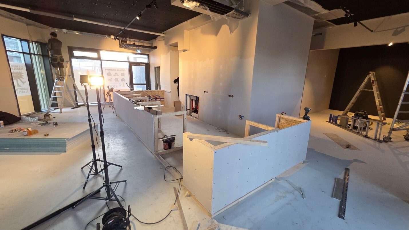 Café — before, mid-construction with bare walls